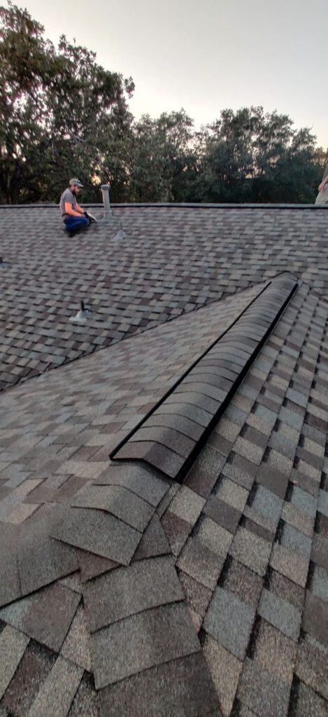 Freshly installed roof shingles on residential home in Navasota, Texas.